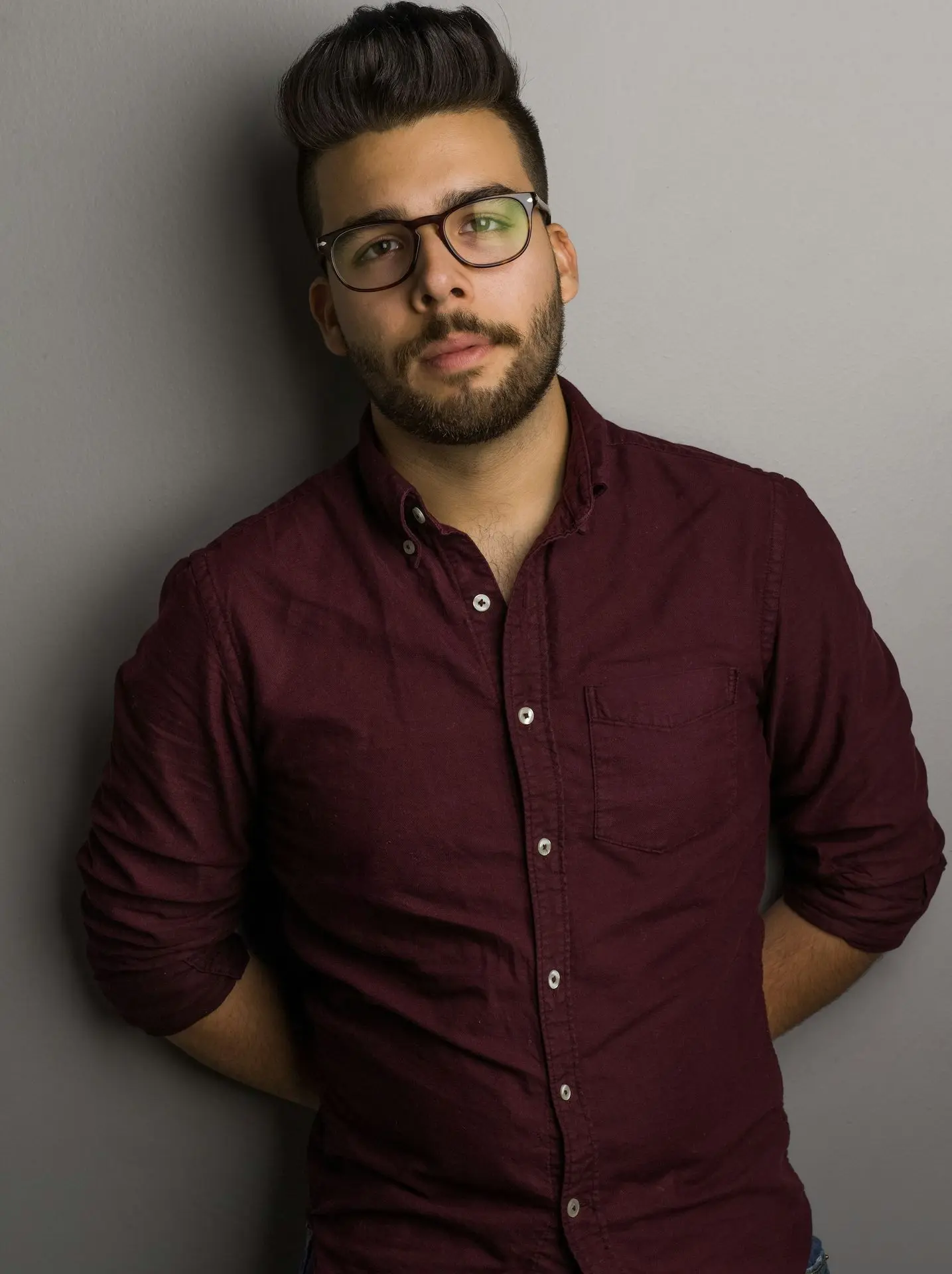 man in maroon sport shirt